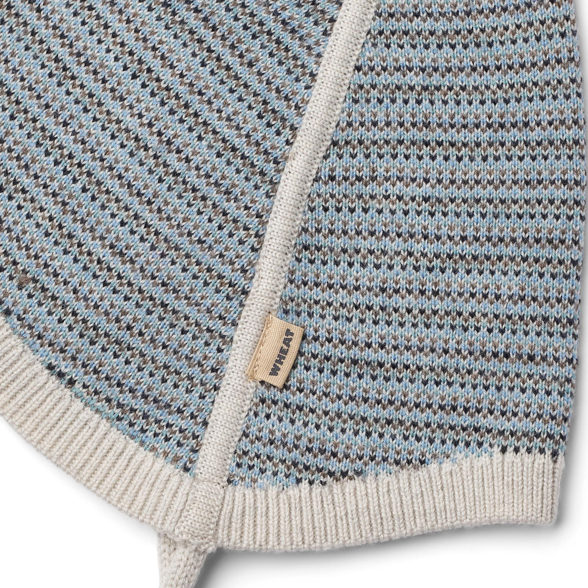 WHEAT | Liro strikkelue i 100% merinoull